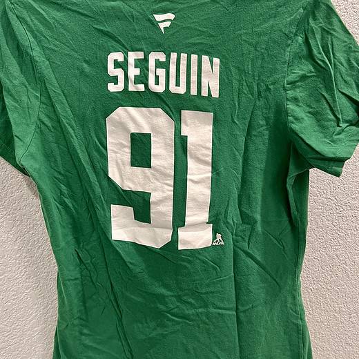 Back view showing ‘SEGUIN’ and his number ‘91’ in bold white lettering, signifying the player Tyler Seguin.