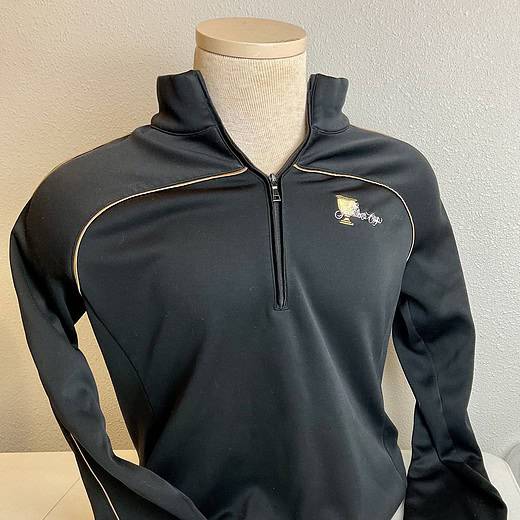 Frontal view of a black EP Pro quarter-zip sweatshirt featuring a sleek design with gold piping and an embroidered Presidents Cup logo, showcasing a sporty and professional look.