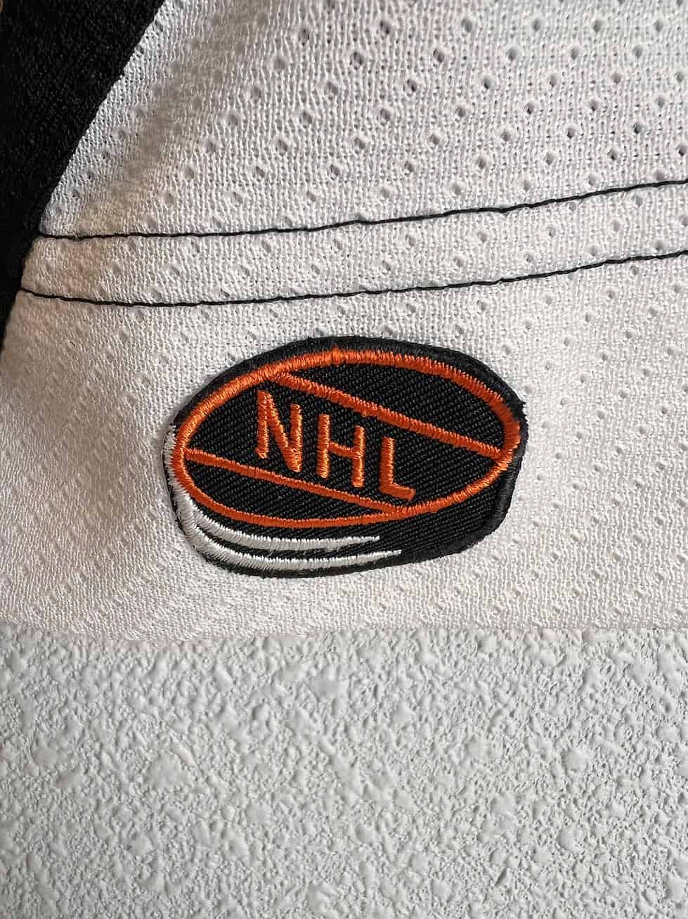 Close-up of the NHL patch on the Pittsburgh Penguins jersey