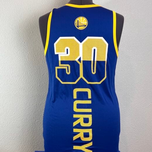 Back view of a Warriors blue tank top with '30 CURRY' in yellow, representing player Stephen Curry