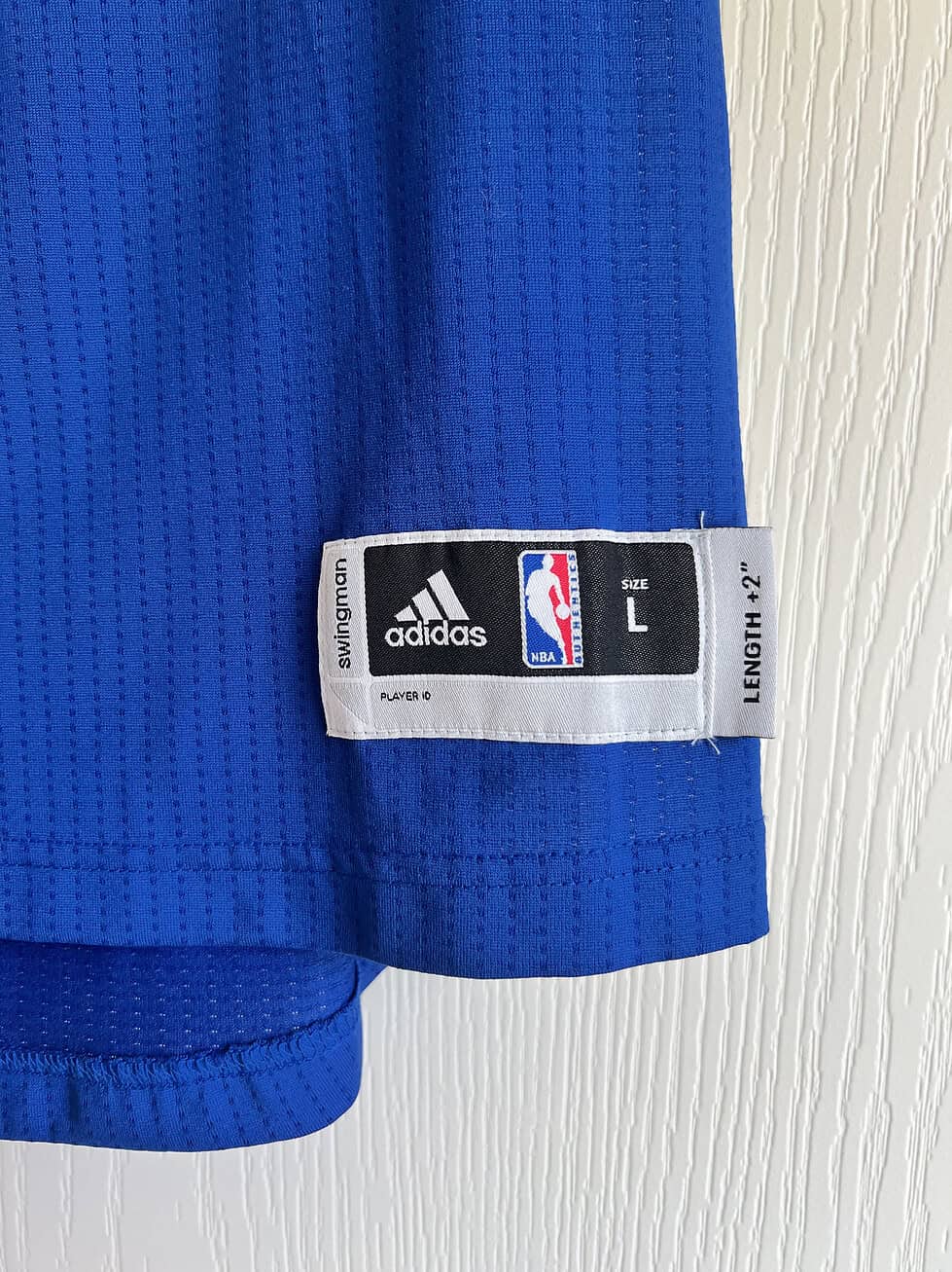 Tag on Stephen Curry Youth Large Jersey in blue
