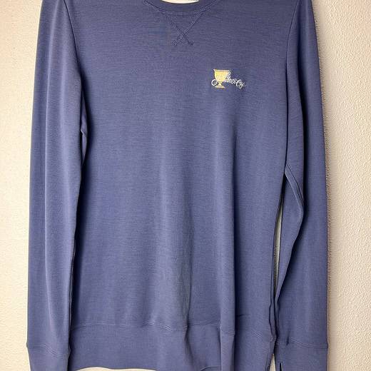 Blue Nike Golf long-sleeve pullover with Presidents Cup 2013 logo on the front.