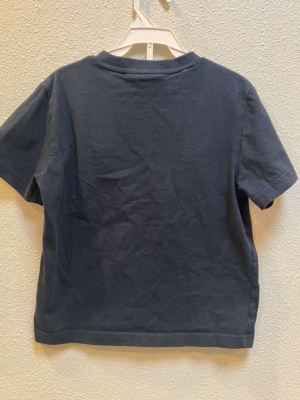 Back view of black kids t-shirt