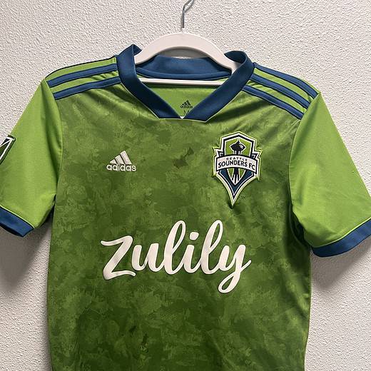 Front view of Seattle Sounders FC 2019-2020 jersey with Zulily sponsor logo.