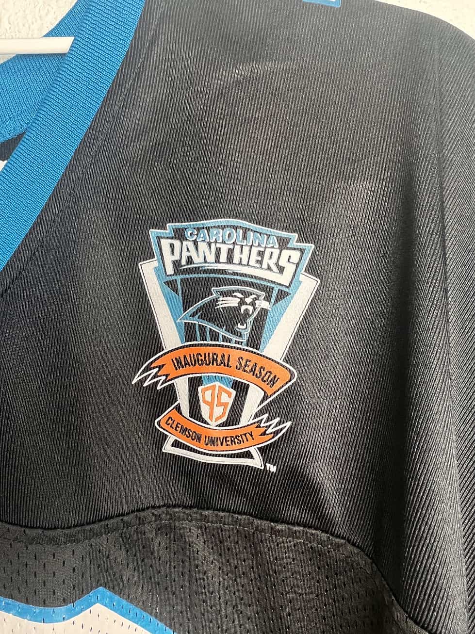 Close-up of the Carolina Panthers Inaugural Season patch from 1995 on a vintage Kerry Collins jersey.