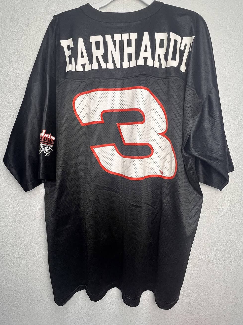 Back view of the Dale Earnhardt Sr. NASCAR Jersey with "Earnhardt" and the number 3.