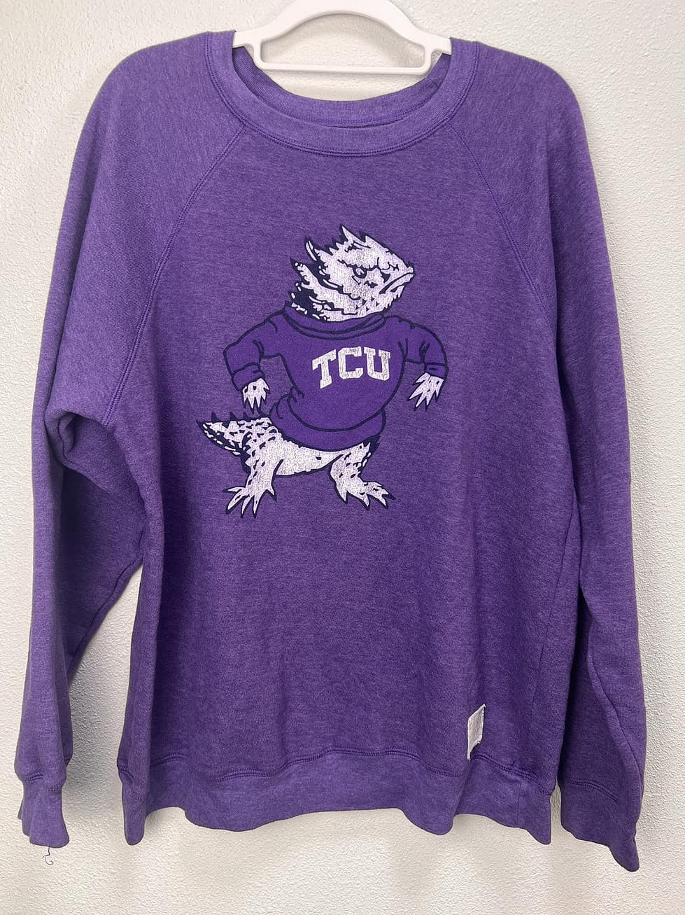 Front view of the TCU Horned Frog purple crewneck sweatshirt