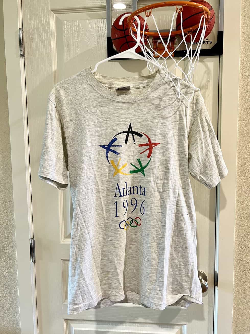 Front view of vintage Atlanta 1996 Olympics T-Shirt in heather grey.