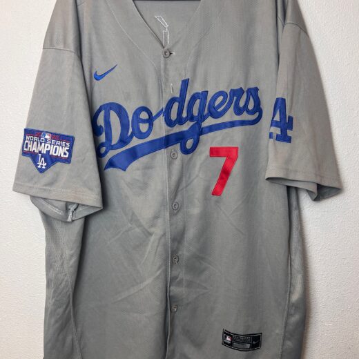 Front view of a gray Los Angeles Dodgers Nike jersey featuring Julio Urías’ number 7, with a 2020 World Series Champions patch on the sleeve.