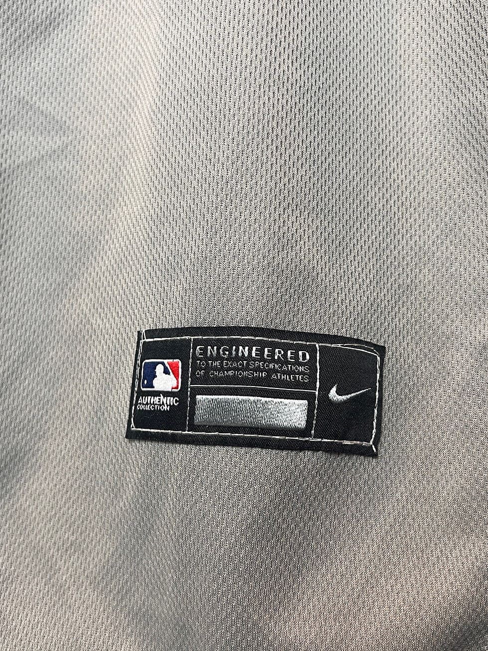 Close-up of the “Authentic Collection” tag on a Los Angeles Dodgers Nike jersey.