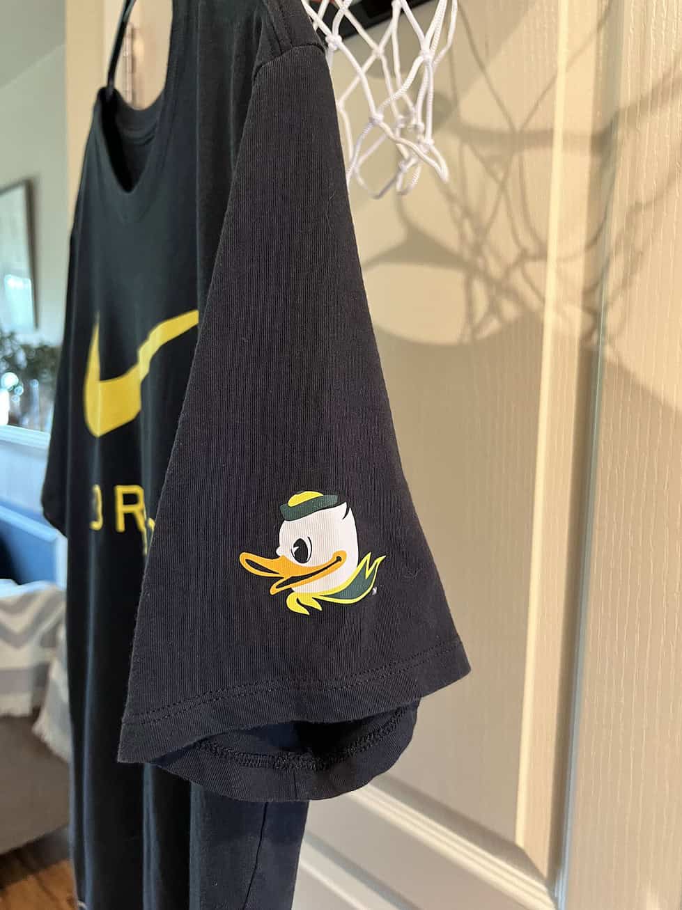 Side view of Oregon Ducks T-Shirt showcasing the Oregon Duck mascot on the sleeve.