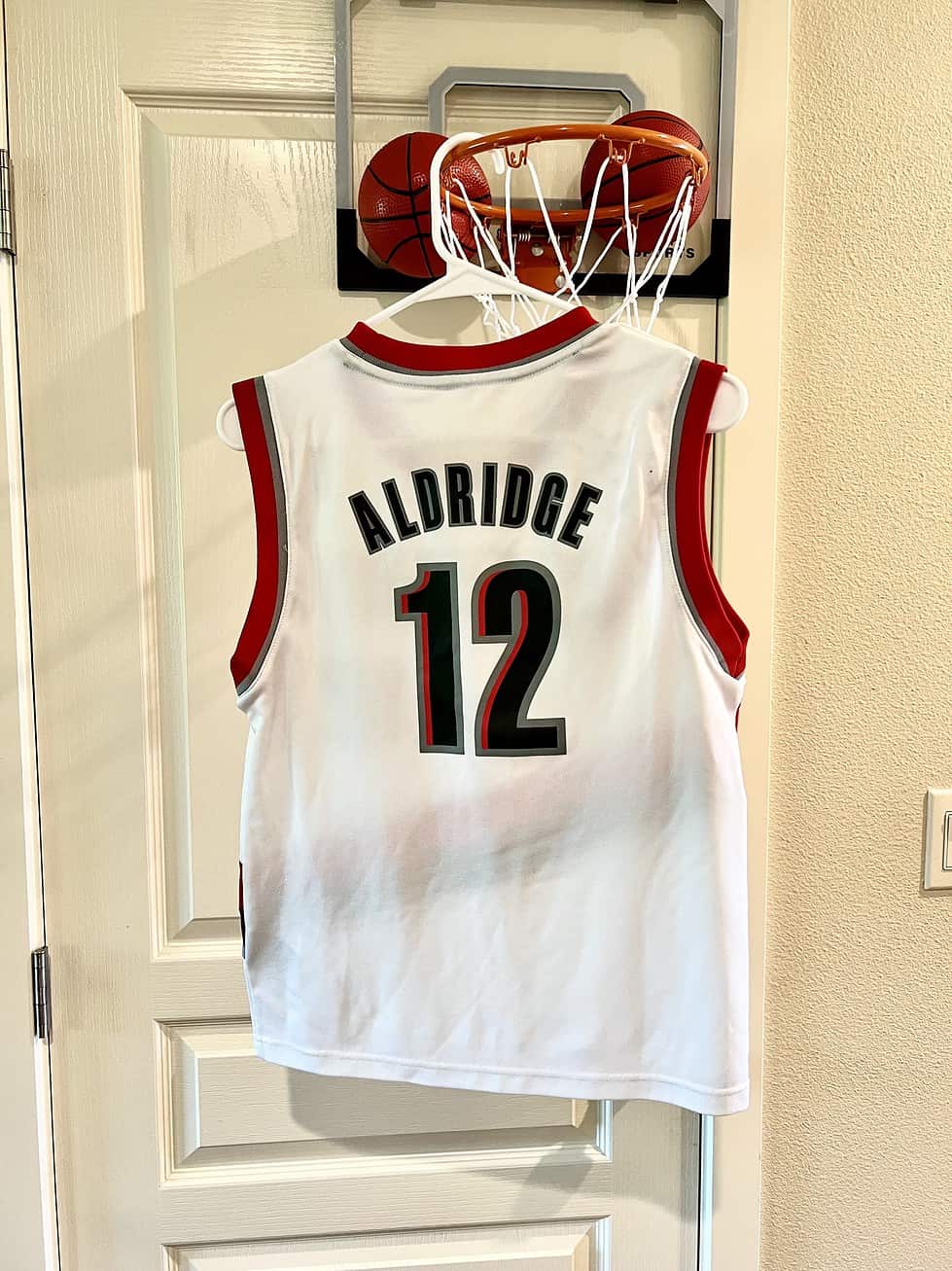 Back view of LaMarcus Aldridge Portland Trail Blazers Youth Jersey with name “Aldridge” and number 12.