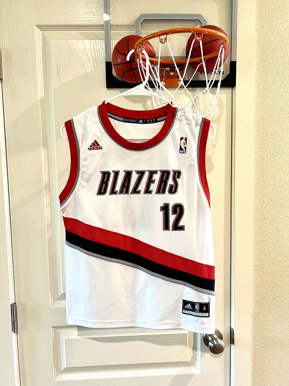 Front view of LaMarcus Aldridge Portland Trail Blazers Youth Jersey showing “Blazers” text and number 12.