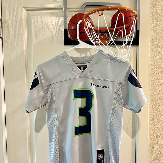 Front view of Russell Wilson Seattle Seahawks Jersey with number 3 and “Seahawks” text.