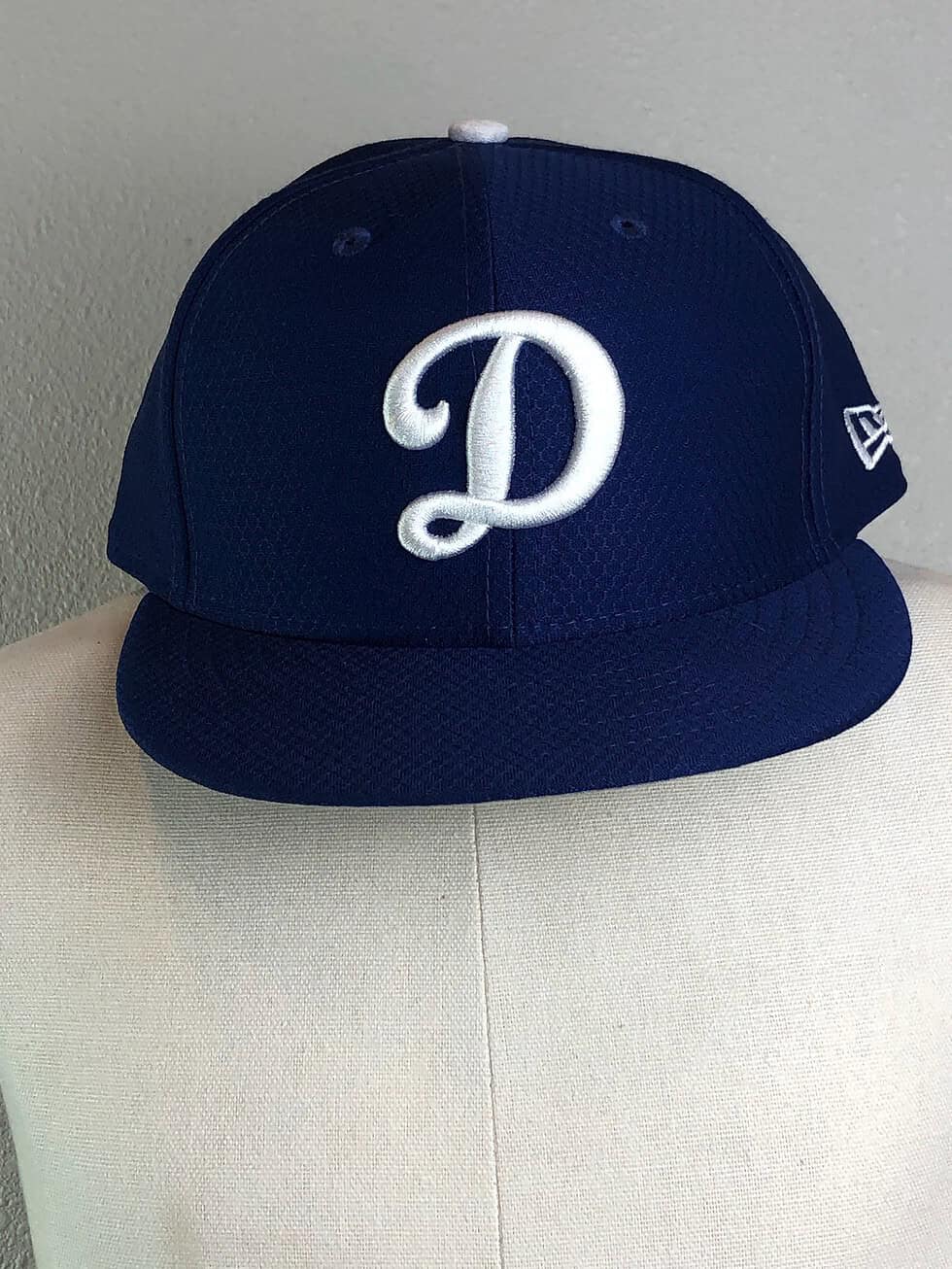 Front view of LA Dodgers fitted blue baseball cap with embroidered Dodgers logo