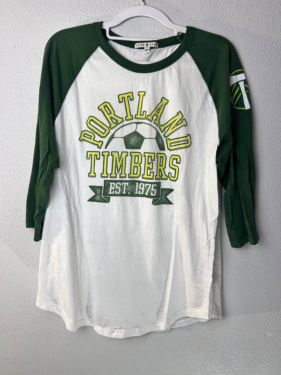 Portland Timbers Junk Food raglan with soccer graphic.