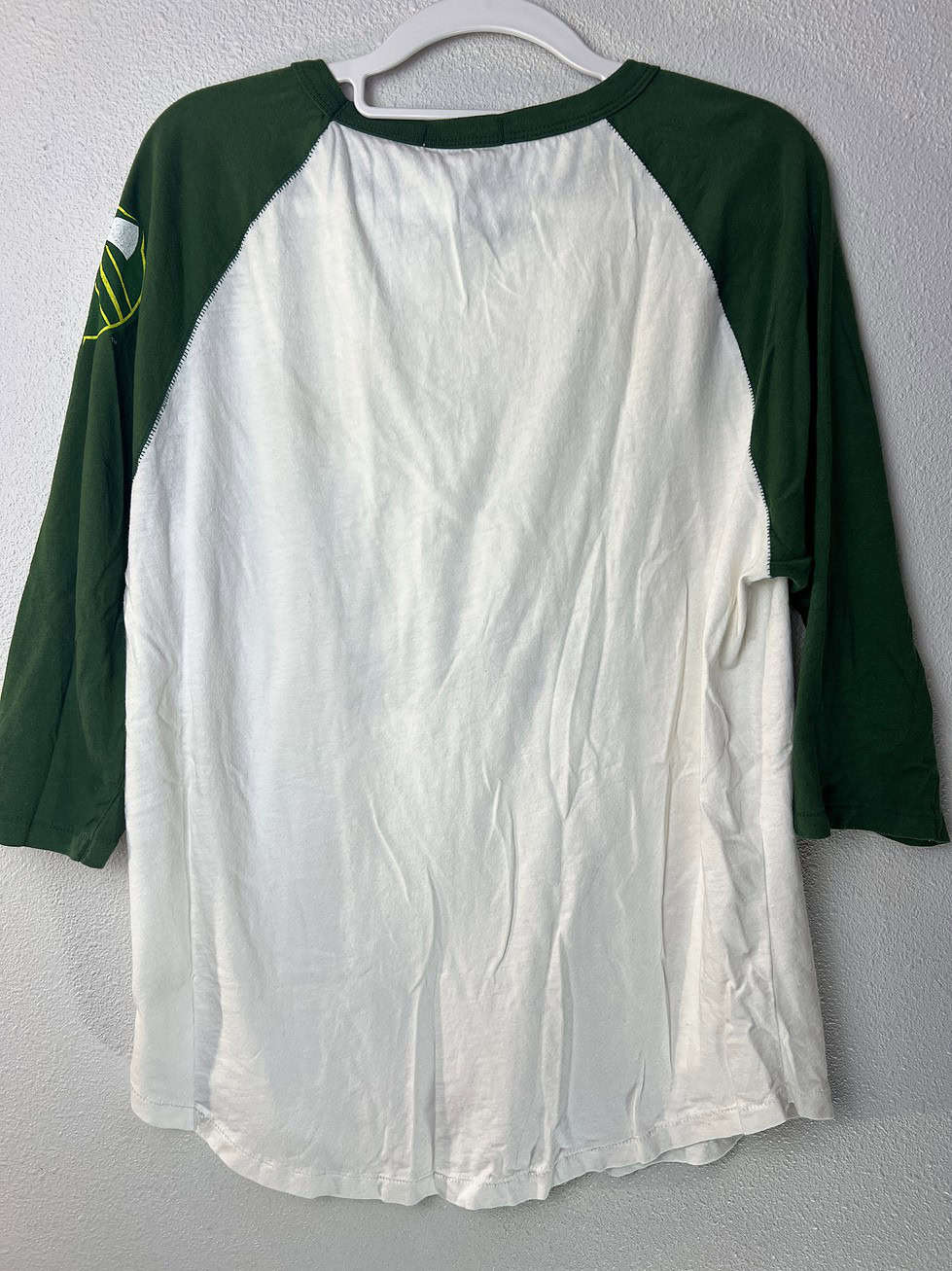 Back of Portland Timbers shirt, 3/4 sleeve, green and white.
