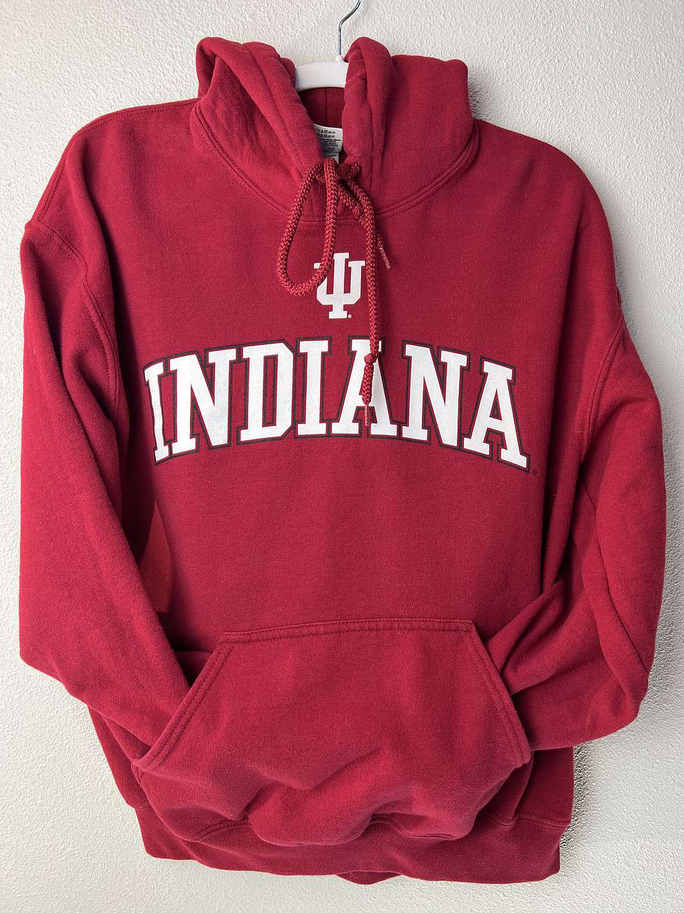 Front view of Indiana Hoosiers red hoodie with white "INDIANA" lettering.