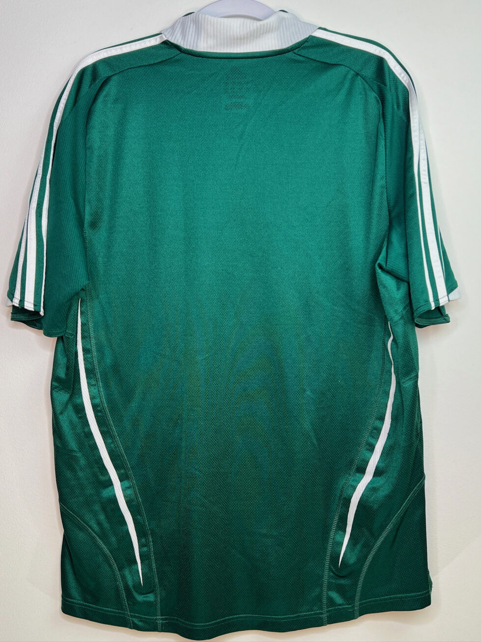 Back view of green Adidas Timbers jersey