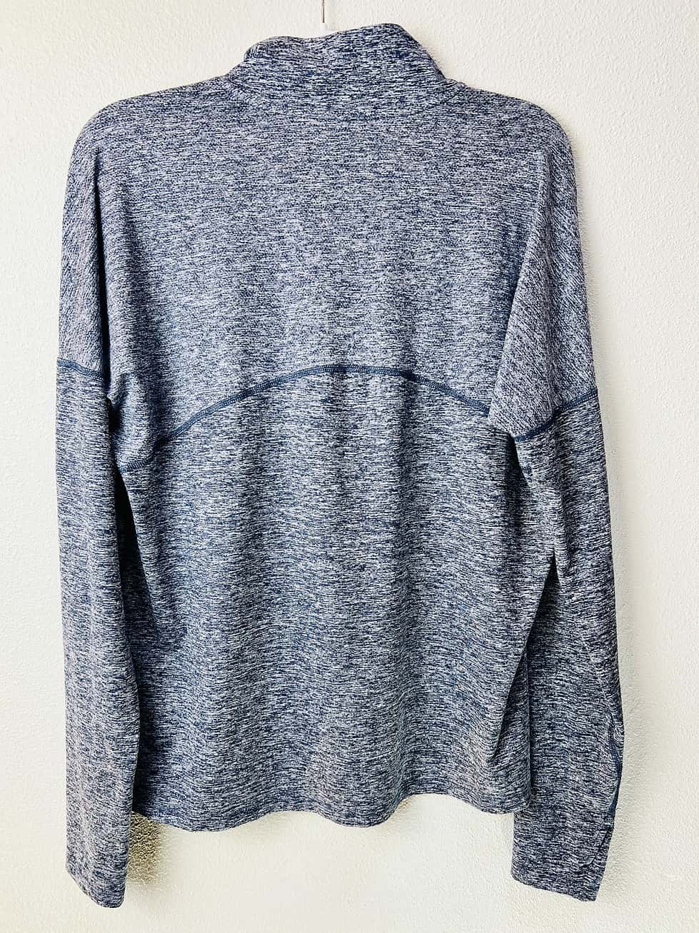 Back view of lightweight Dri-FIT pullover with long sleeves.