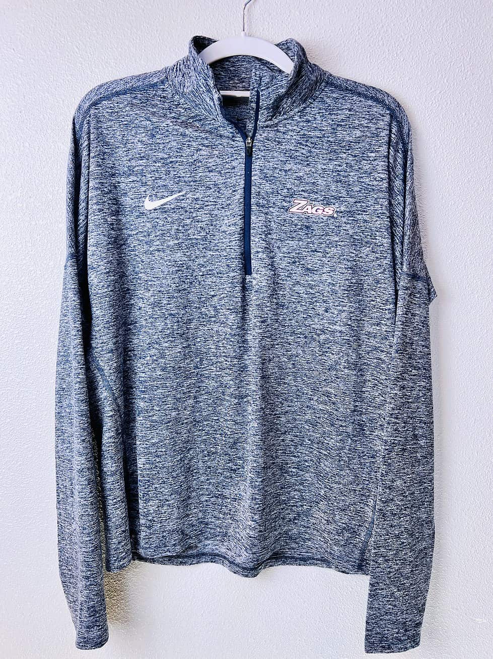 Front view of Gonzaga Bulldogs Nike 1/4 zip Dri-FIT pullover in heathered navy.