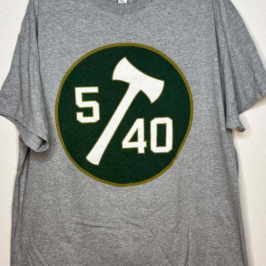 Front of grey t-shirt with green, yellow, and white printing