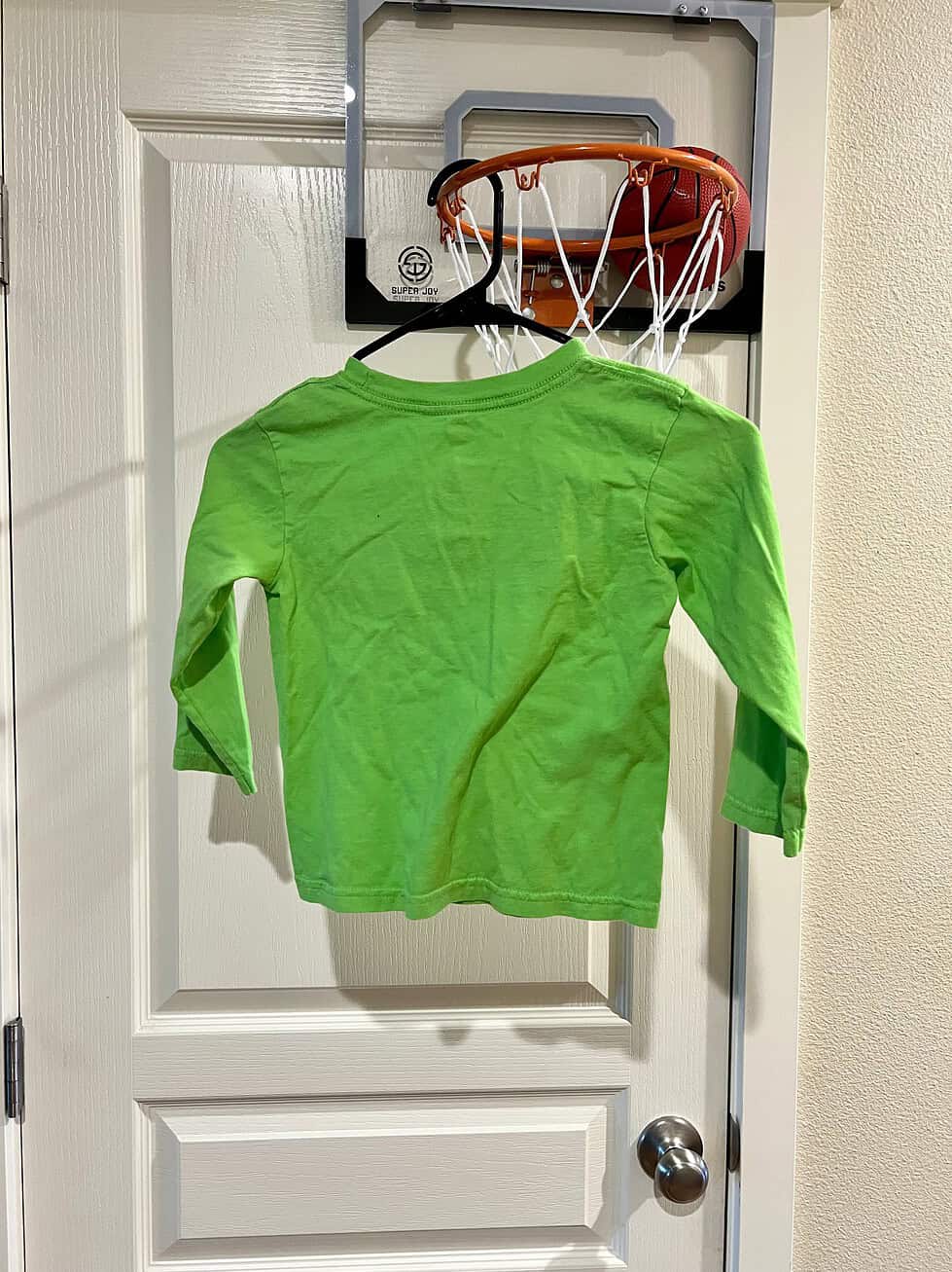 Back view of a bright green Seattle Seahawks youth small long-sleeve shirt.