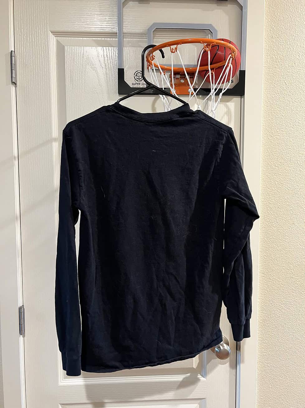 Back view of a black Gildan long-sleeve T-shirt featuring a Kobe Bryant graphic, size Small.