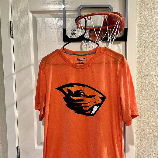 Front view of an orange Champion T-shirt featuring the Oregon State Beavers logo, Adult Large.