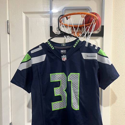 Front view of a Kam Chancellor #31 youth jersey with Seahawks branding and NFL logo.