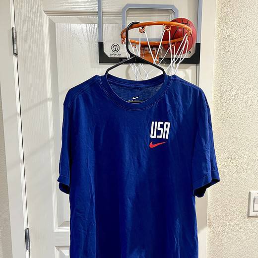 Front view of a Nike USA Soccer T-shirt with "USA" text and red Nike swoosh, Adult XL.