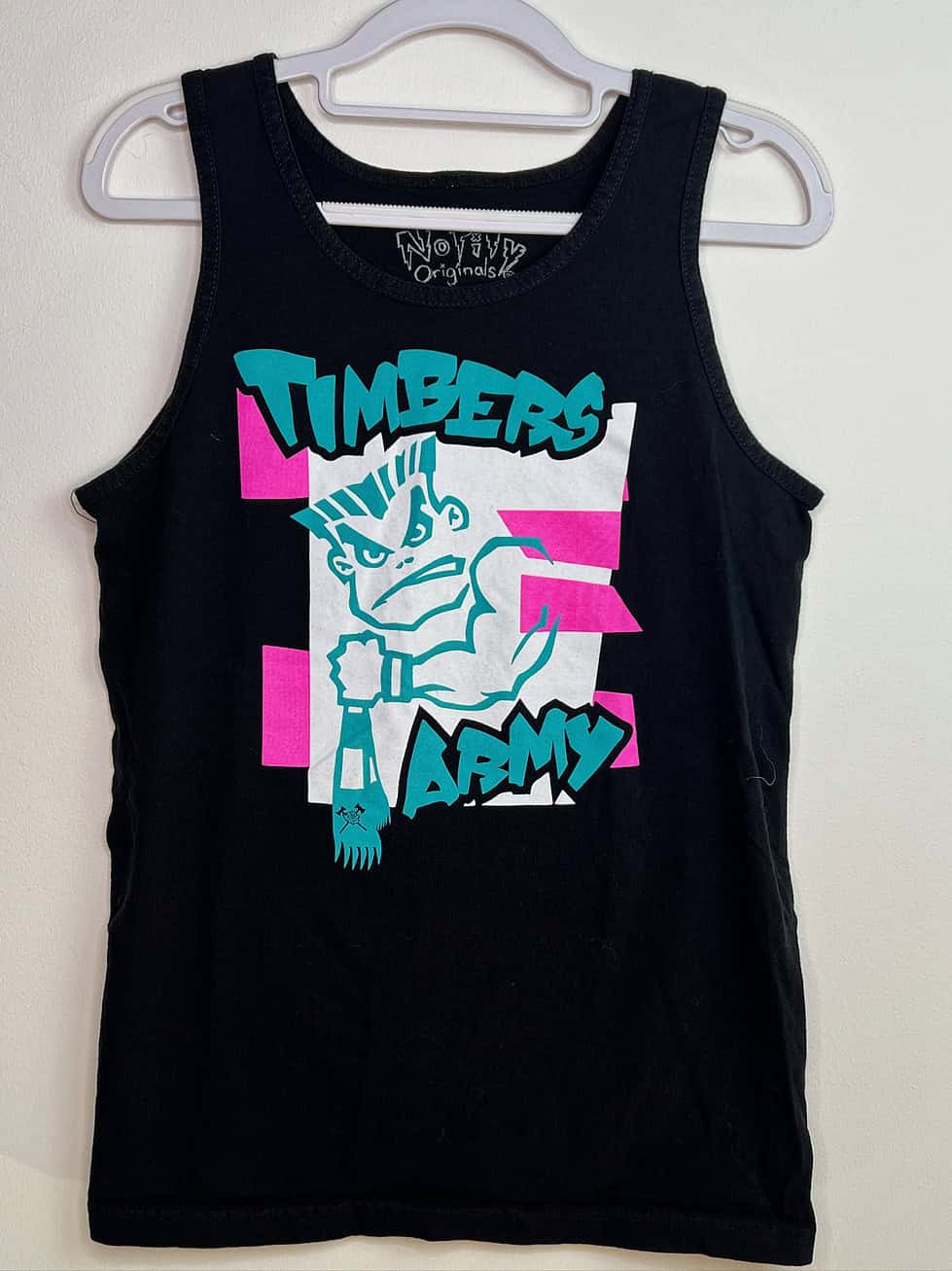 Timbers Army sleeveless tank top with punk-inspired mascot graphic in teal and pink