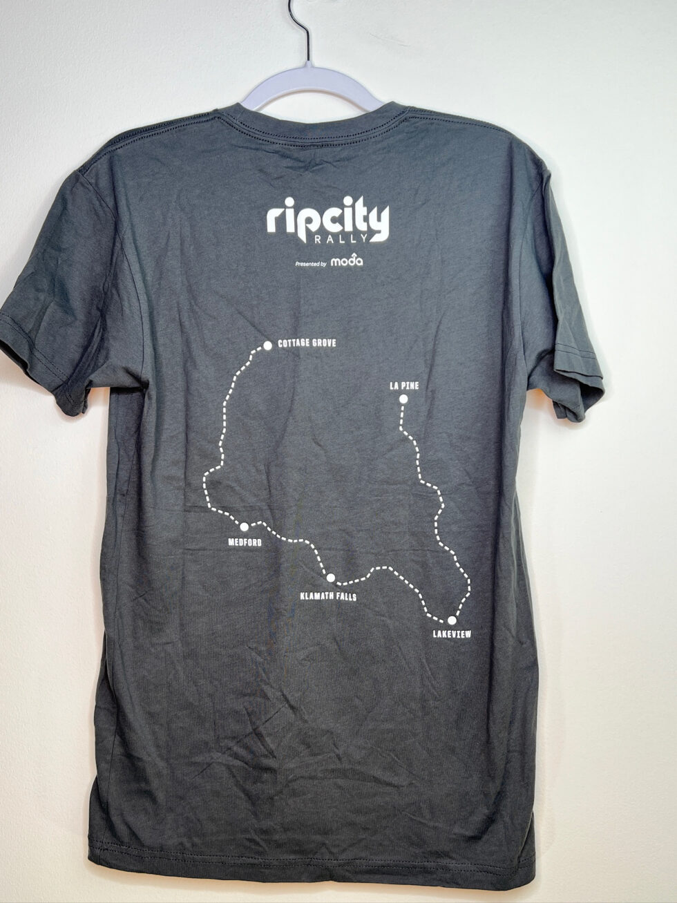 Back view of Rip City Rally tee with rally route through five Oregon cities