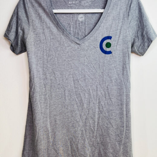 Front of No Pity Originals Cascadia v-neck t-shirt with small ‘C’ logo