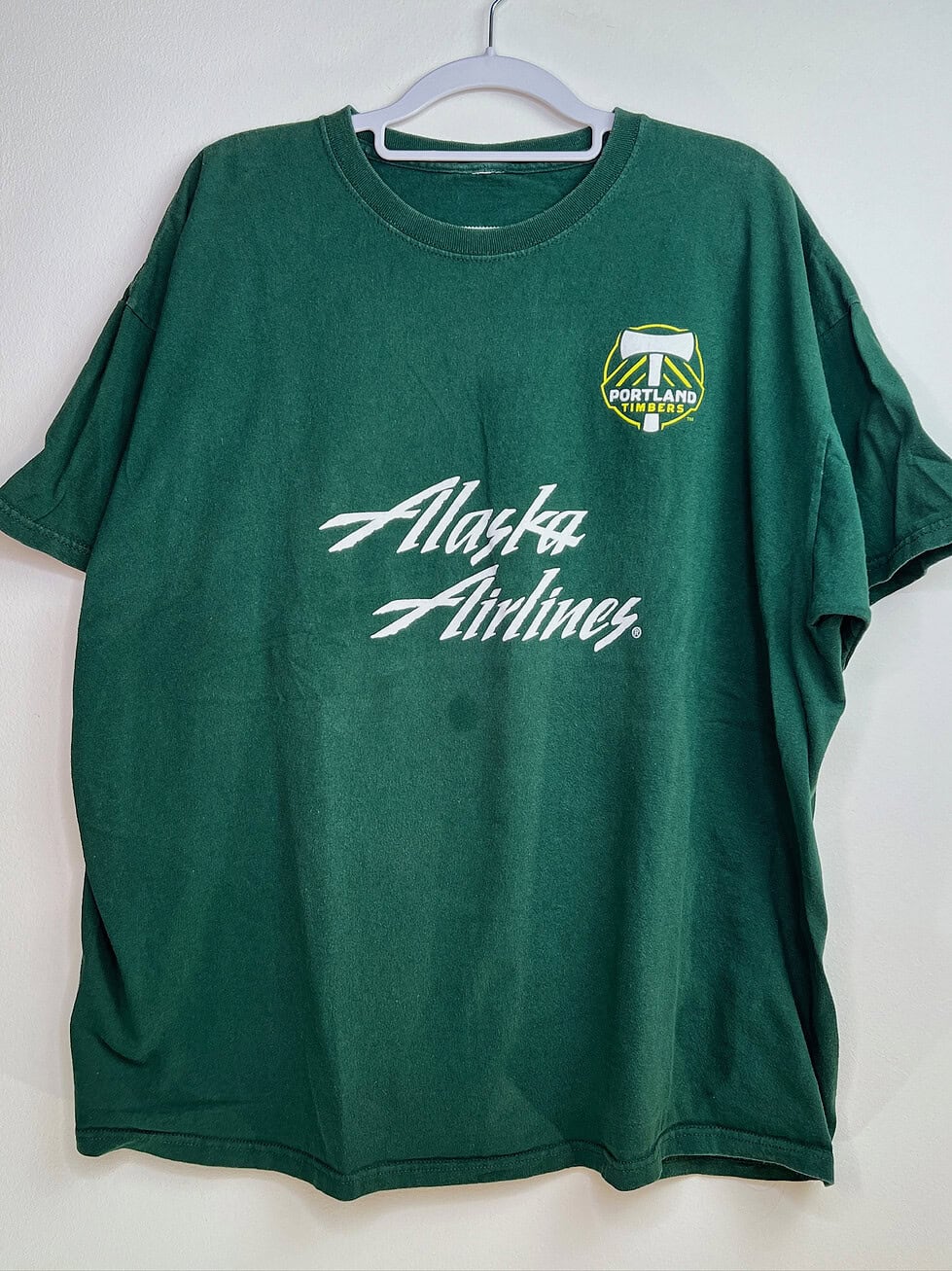 Front view of Portland Timbers green t-shirt with team crest