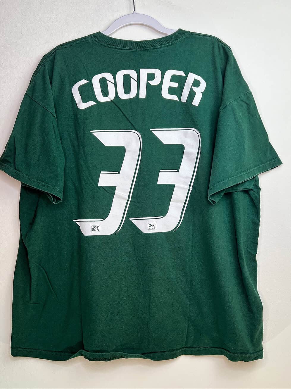 Back view of t-shirt showing “Cooper #33”