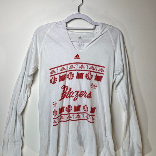 Front of sweatshirt. Printed red design in style of knit stitches