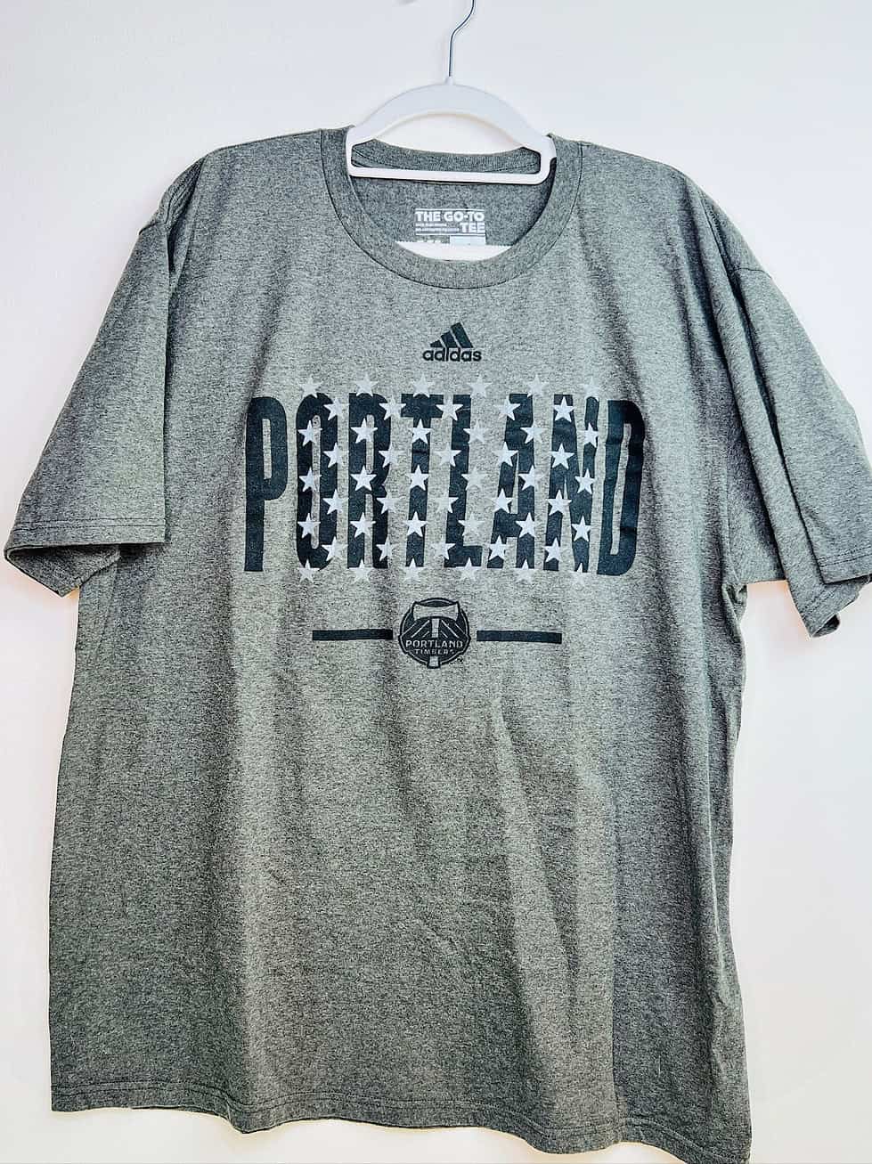 Front of Portland Timbers Adidas stars-and-stripes graphic t-shirt