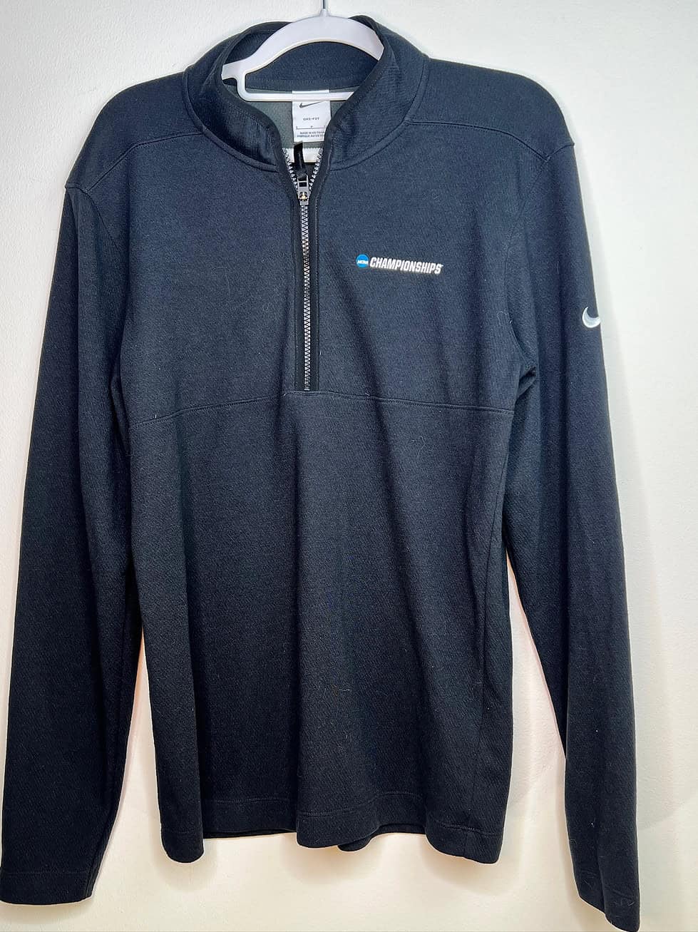 Nike NCAA Championships black quarter-zip with logo on chest, size Small