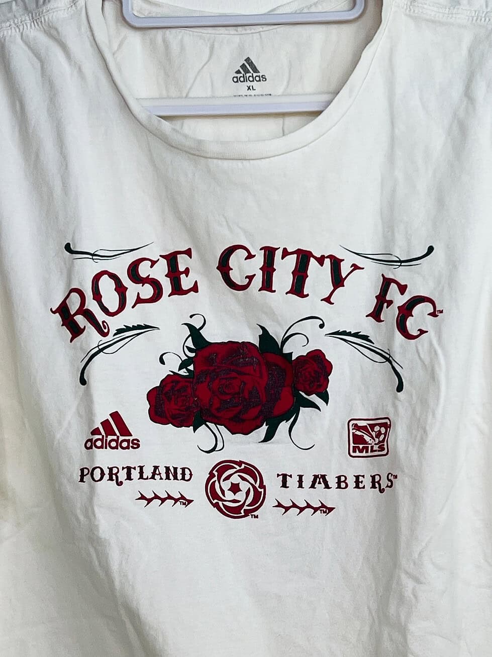 Close-up of Rose City FC logo and Timbers branding