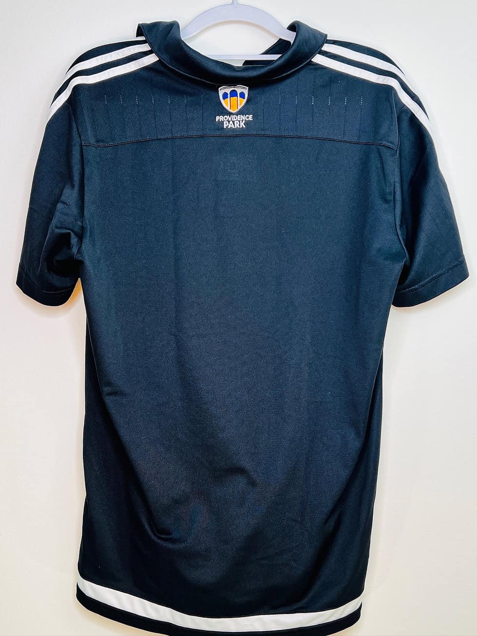 Back view with Providence Park logo