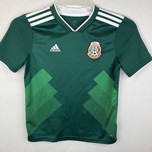 Front view of green Adidas Youth Mexico soccer jersey, size Medium, featuring Mexico crest and zigzag graphics.