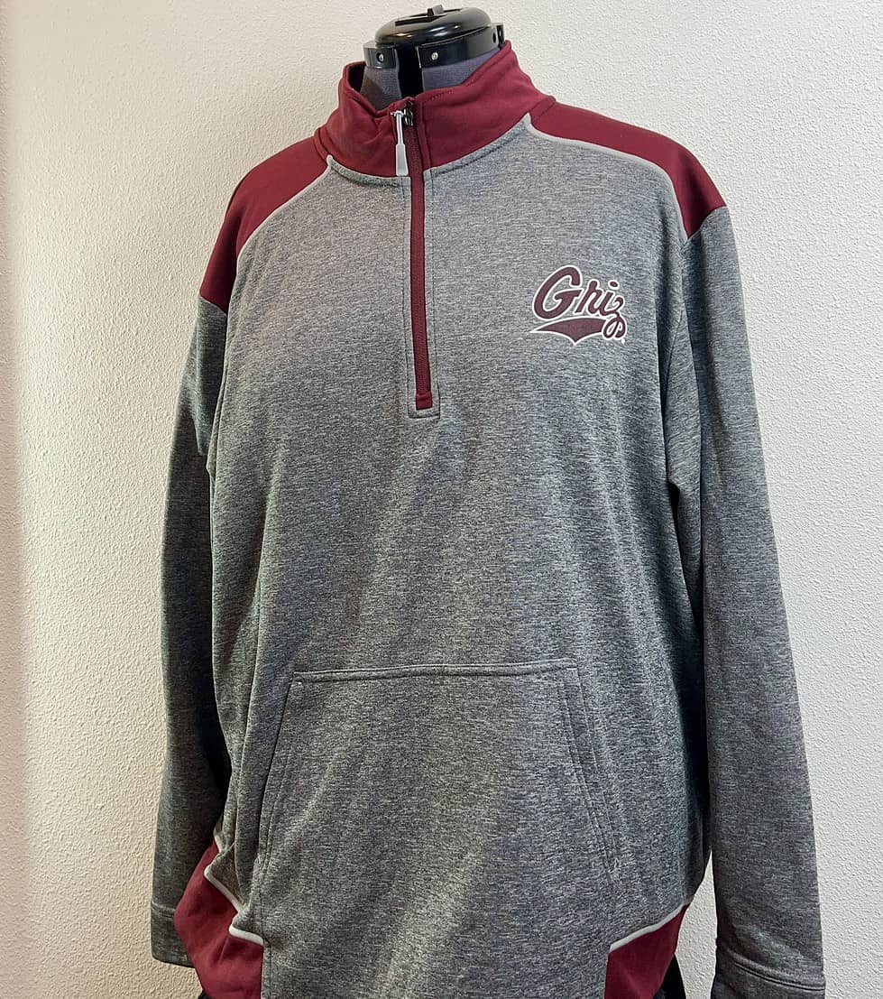 Gray Montana Grizzlies 1/4-zip sweatshirt (size 2XL) with maroon accents and "Griz" logo on chest, displayed on mannequin.