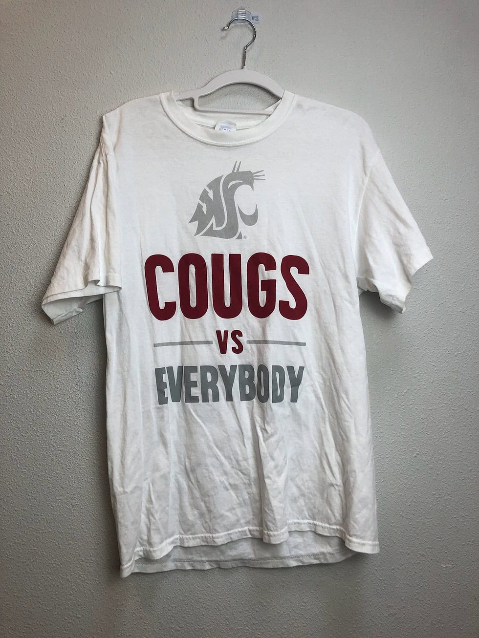 Front view of white WSU “Cougs vs Everybody” t-shirt with crimson and gray graphics.