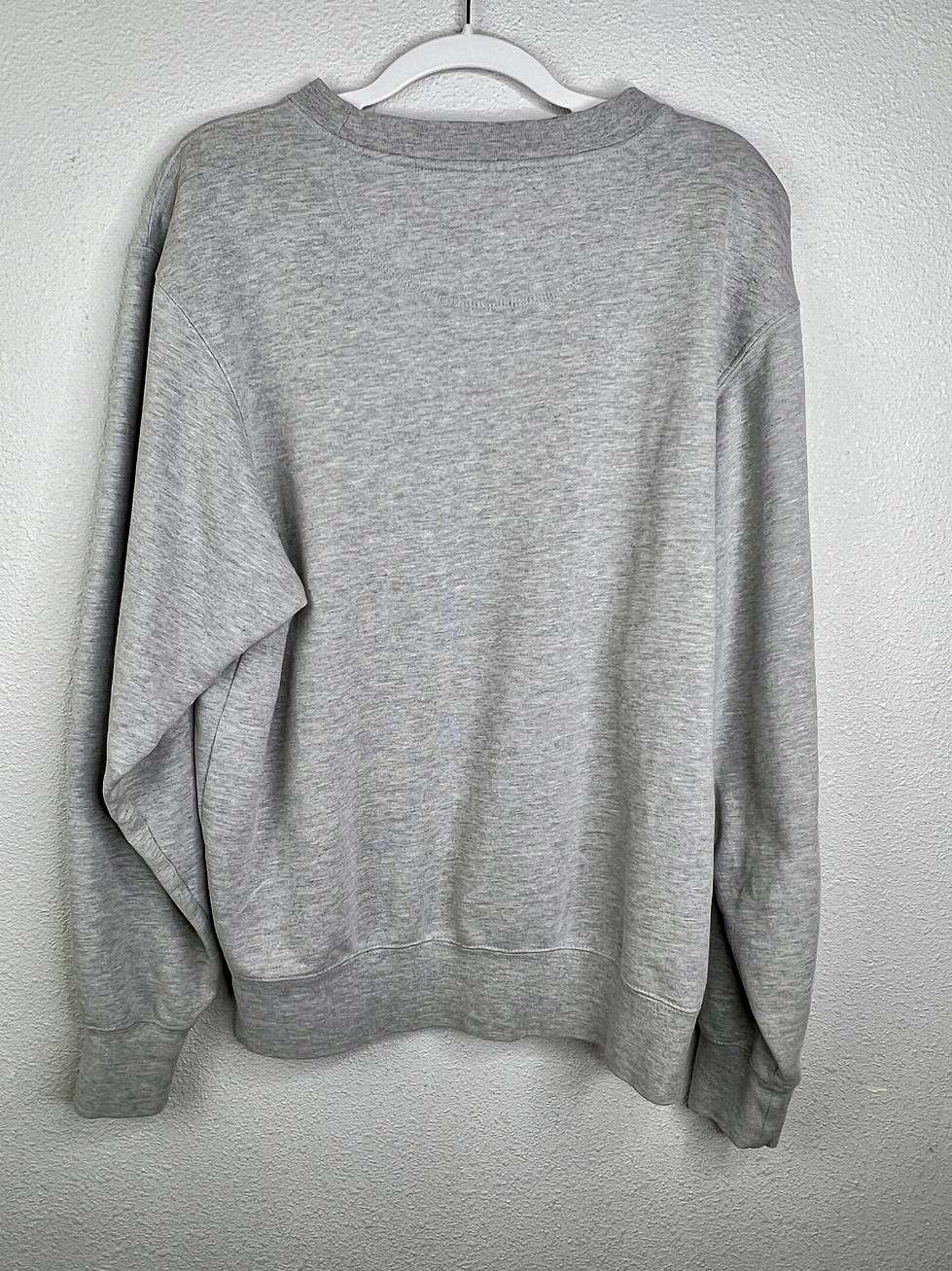 Back view of gray Kansas crewneck sweatshirt, size small, with a relaxed fit.
