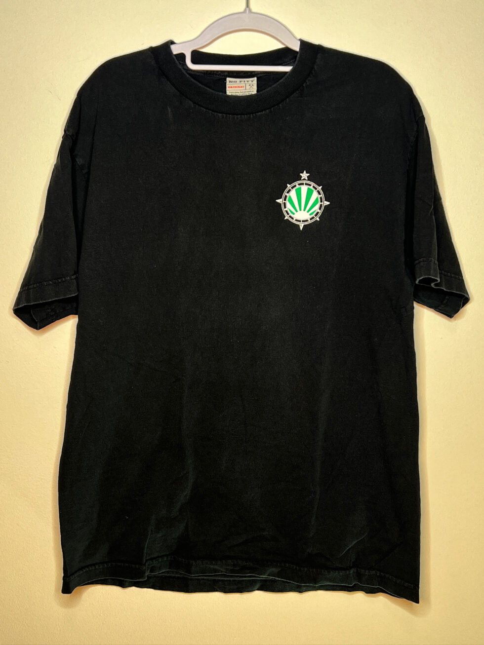 Front view of Timbers Army tee with small Timbers crest, men’s large