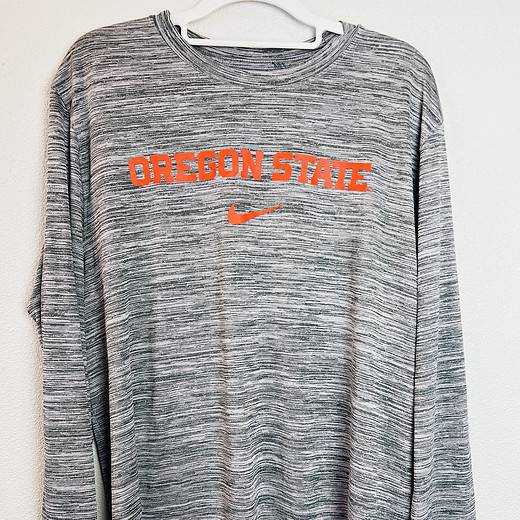 Gray Oregon State Nike long-sleeve performance tee with orange "Oregon State" text and Nike swoosh, size large.