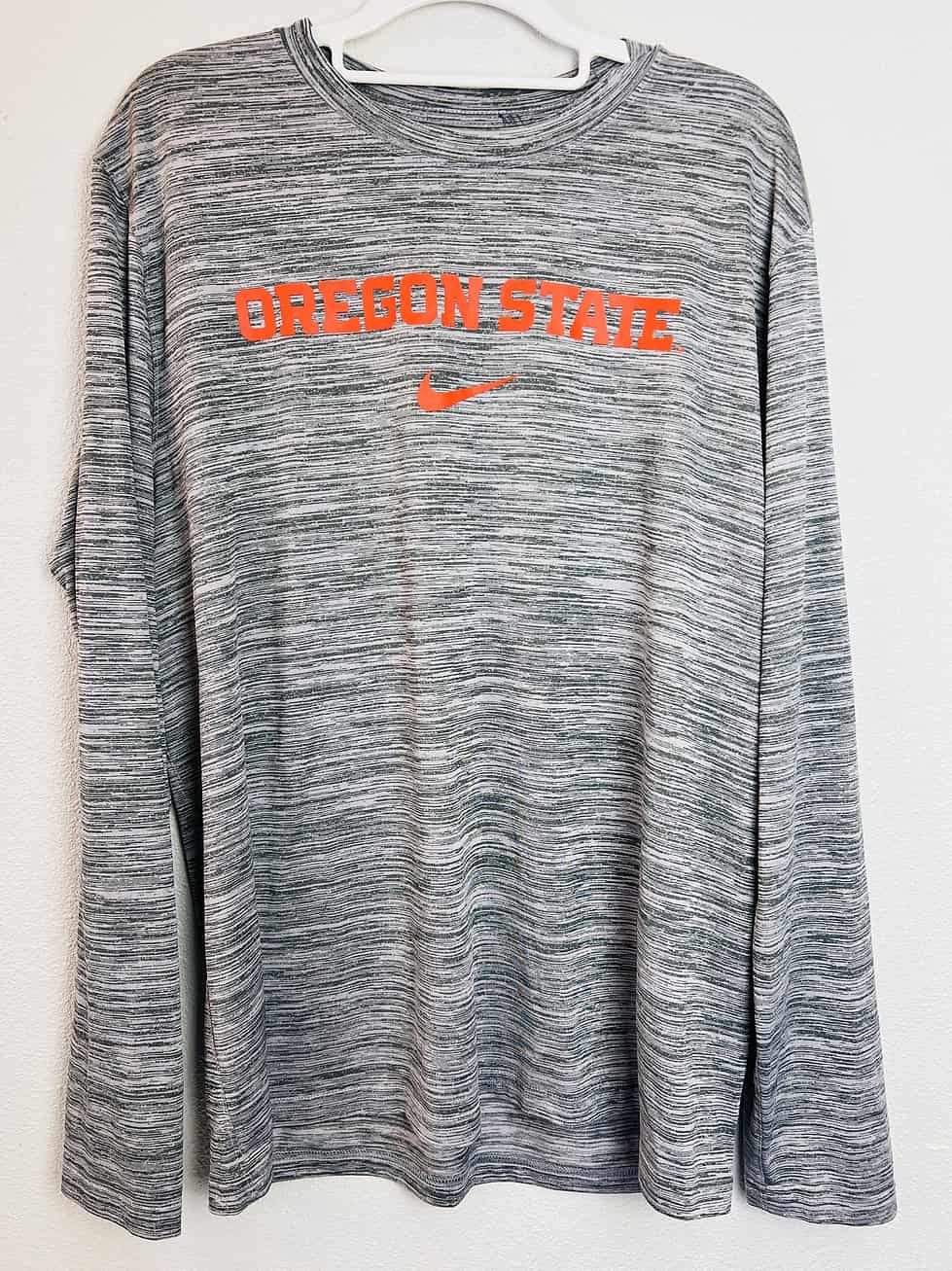 Gray Oregon State Nike long-sleeve performance tee with orange "Oregon State" text and Nike swoosh, size large.