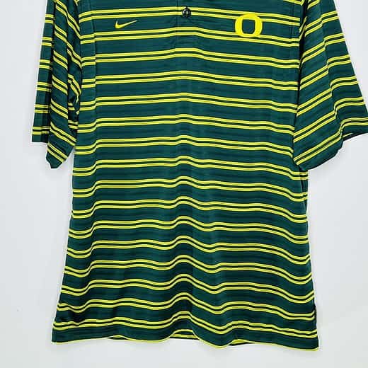 Front view of team-issued Oregon Ducks Nike striped polo shirt with yellow 'O' logo.