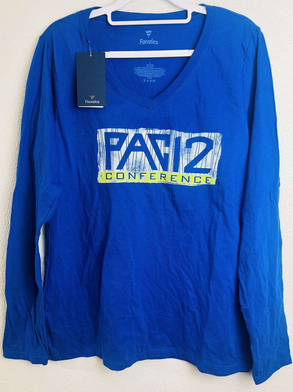 Front of royal blue Pac-12 Conference long-sleeve tee by Fanatics with distressed graphic.